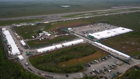 Work progresses on a new migrant detention facility dubbed "Alligator Alcatraz," at Dade-Collier Training and Transition facility in the Florida Everglades, Friday, July 4, 2025, in Ochopee, Fla. (AP Photo/Rebecca Blackwell)