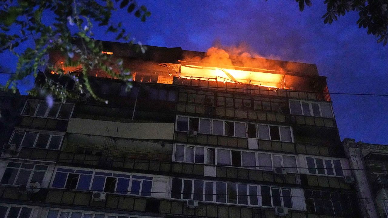 A fire burns at a residential building in Kyiv, Ukraine, after a Russian attack early Thursday morning.