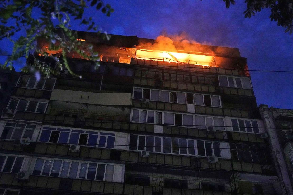 A fire burns at a residential building in Kyiv.