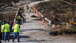 Crews work on the Cade Loop Bridge to clear debris after flooding along the Guadalupe River on Thursday, July 10, 2025, in Ingram, Texas.