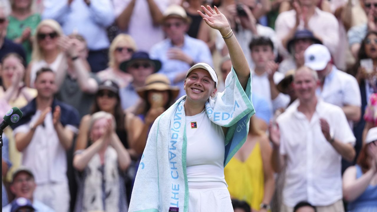 Amanda Anisimova of the U.S. celebrates winning the women's singles semifinal match against Aryna Sabalenka of Belarus at the Wimbledon Tennis Championships in London, Thursday, July 10, 2025.(AP Photo/Kirsty Wigglesworth)