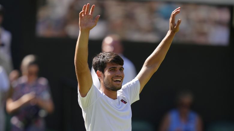 Carlos Alcaraz of Spain celebrates winning the men's semifinal singles match against Taylor Fritz of the U.S. at the Wimbledon Tennis Championships in London, Friday, July 11, 2025.(AP Photo/Kirsty Wigglesworth)