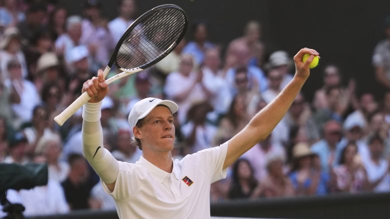 Jannik Sinner of Italy celebrates winning the men's semifinal singles match against Novak Djorkovic of Serbia at the Wimbledon Tennis Championships in London, Friday, July 11, 2025.(AP Photo/Kirsty Wigglesworth)