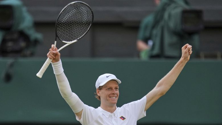 Italy's Jannik Sinner celebrates after beating Carlos Alcaraz of Spain to win the men's singles final at the Wimbledon Tennis Championships in London, Sunday, July 13, 2025. (AP Photo/Kin Cheung)