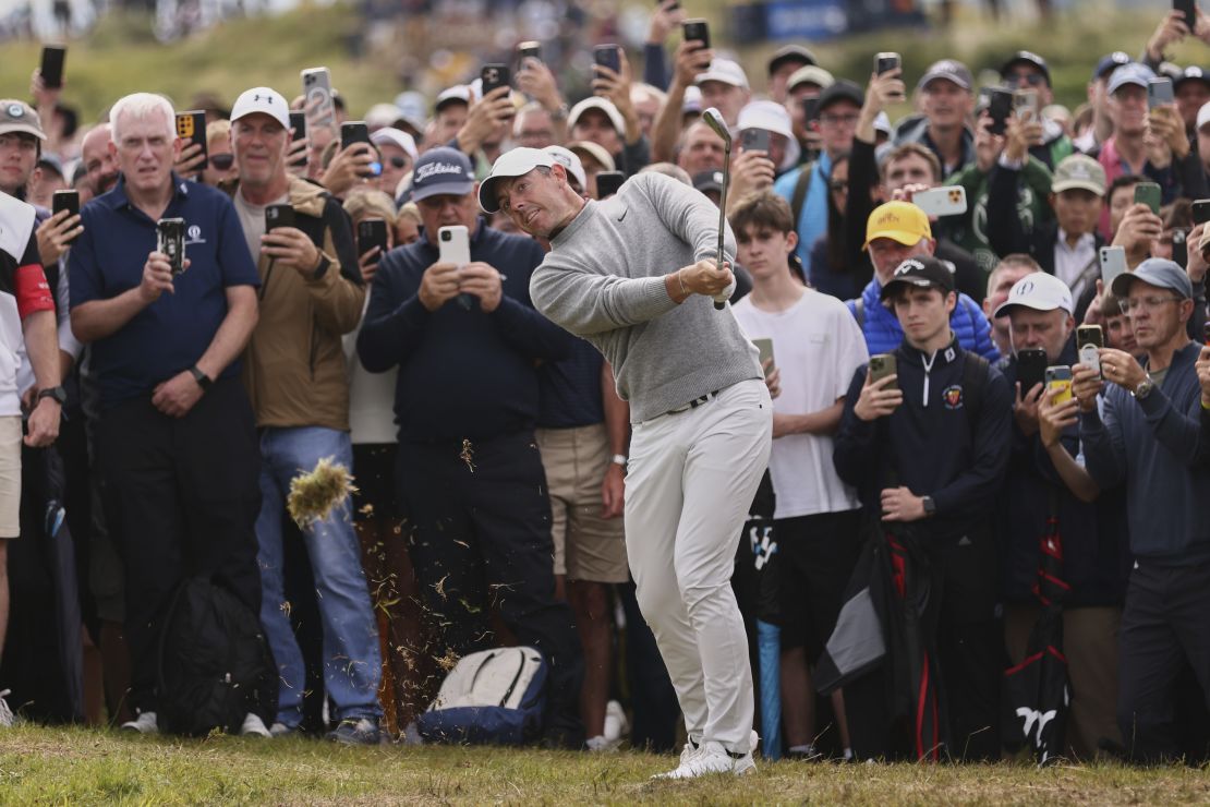 Rory McIlroy shot 1-under par to finish the first round tied for 20th in his birthplace of Northern Ireland.