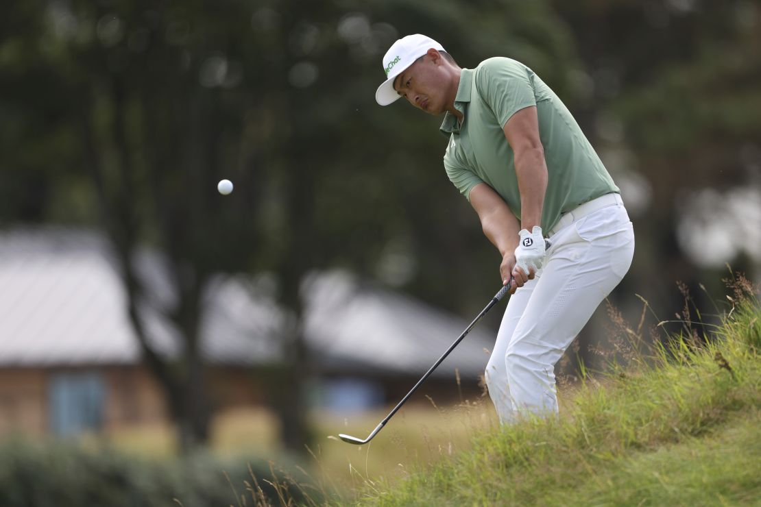 China's Haotong Li Chips on the 4th green during the second round of the Open Championship.