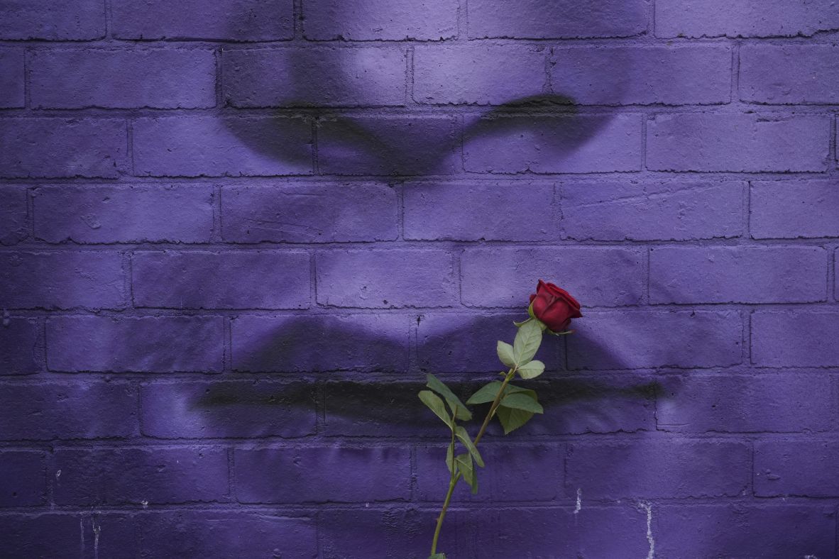 A flower is placed by a mural in Birmingham, England, to commemorate <a  target="_top" href="/newspapers?url=https://www.cnn.com/2025/07/22/entertainment/gallery/ozzy-osbourne">the death of legendary rock star Ozzy Osbourne</a> on Wednesday, July 23. Osbourne died Tuesday at the age of 76.