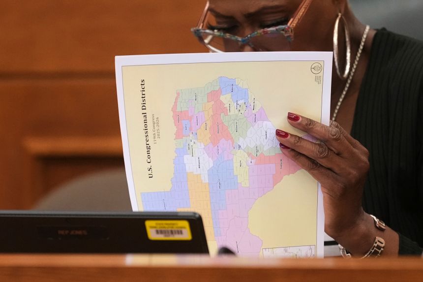 Texas state Rep. Jolanda Jones looks through US Congressional District maps during a redistricting hearing at the Texas Capitol in Austin, Texas on July 24.