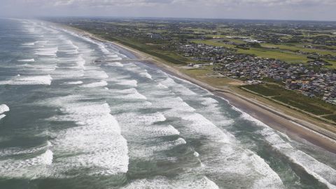 An aerial photo shows white waves crashing onto the Kujukuri Coast in Sosa City, Chiba Prefecture on Wednesday.