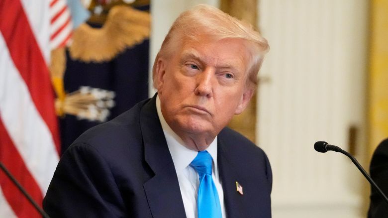 President Donald Trump listens at an event to promote his proposal to improve Americans' access to their medical records in the East Room of the White House, Wednesday, July 30, 2025, in Washington. (AP Photo/Mark Schiefelbein)