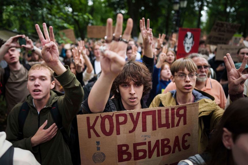 Participants gather at a protest against a law targeting anti-corruption institutions in front of the Ukrainian parliament in Kyiv, Ukraine, on Thursday.