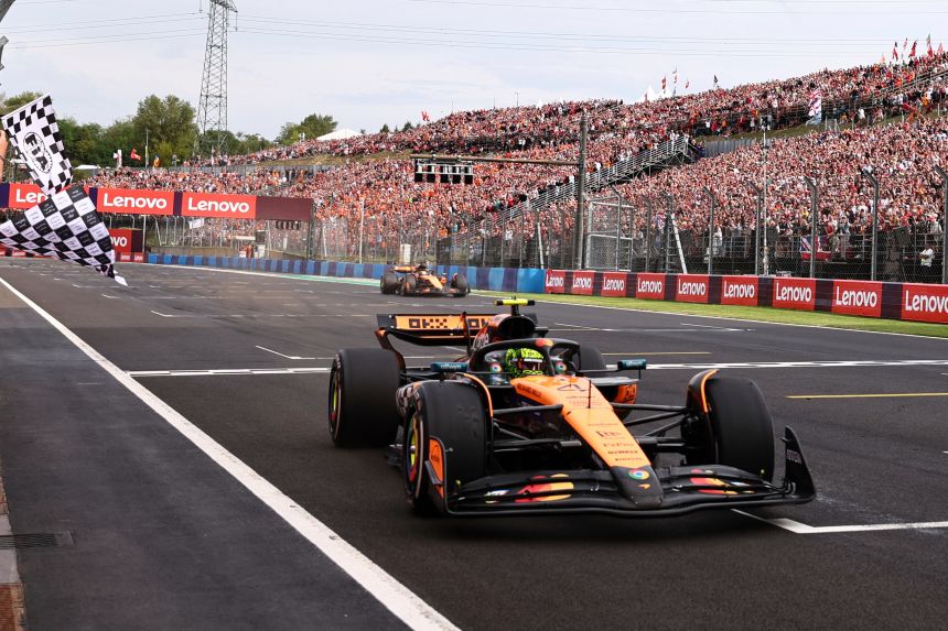 Lando Norris crosses the finish line to seal a historic victory for McLaren.