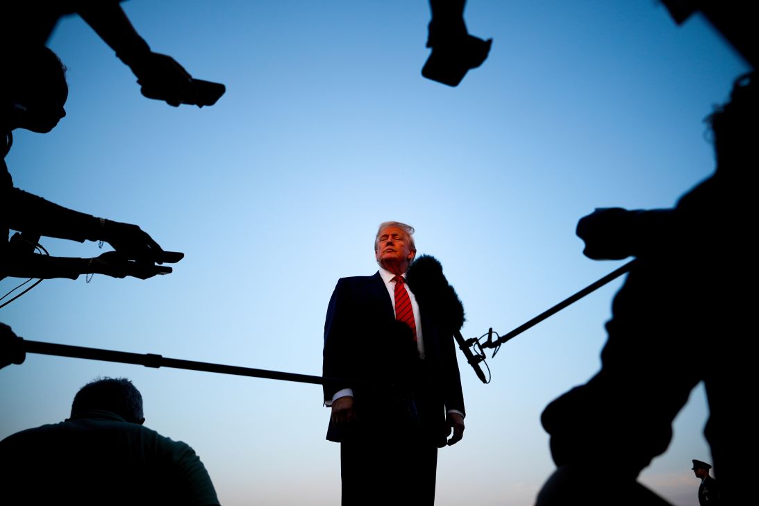 President Donald Trump speaks with reporters before boarding Air Force One at Lehigh Valley International Airport, on August 3, in Allentown, Pennsylvania.