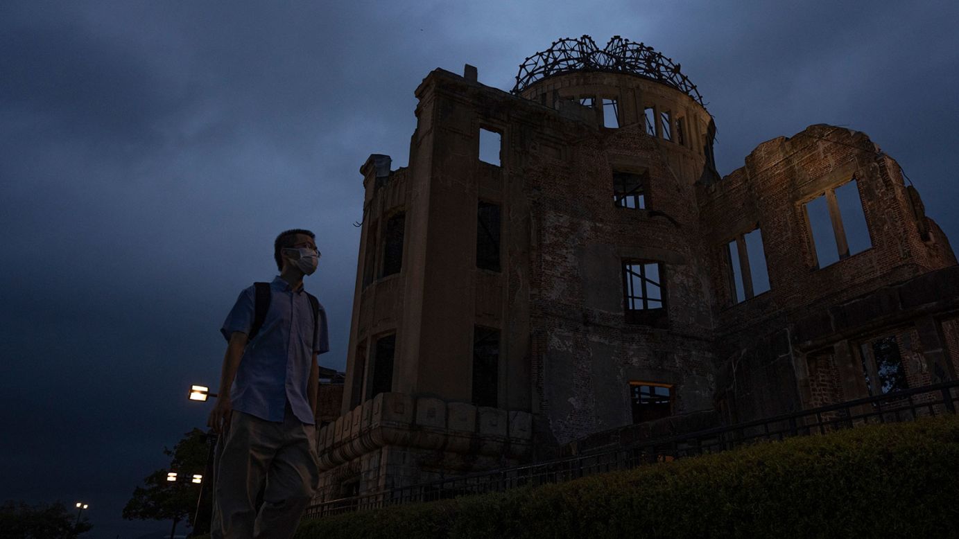 A visitor walks past the Atomic Bomb Dome in Hiroshima, Monday, August 4, 2025, Japan will mark 80th anniversary of the WWII U.S. atomic bombing on August 6.