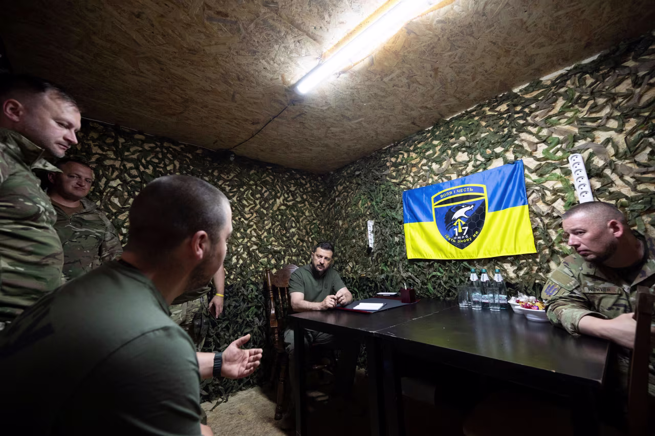 Ukrainian President Volodymyr Zelenskyy visits soldiers on the front lines of the Kharkiv region on August 4.