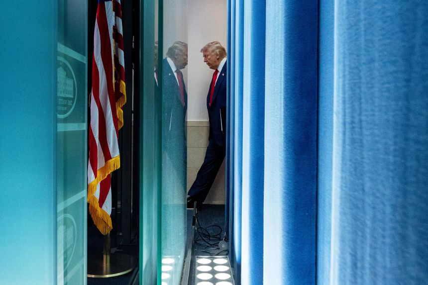 President Donald Trump arrives to the James Brady Press Briefing Room at the White House, on August 11.
