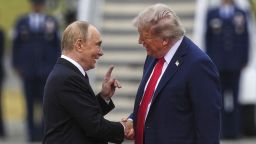 President Donald Trump greets Russia's President Vladimir Putin Friday, Aug. 15, 2025, at Joint Base Elmendorf-Richardson, Alaska. (AP Photo/Julia Demaree Nikhinson)