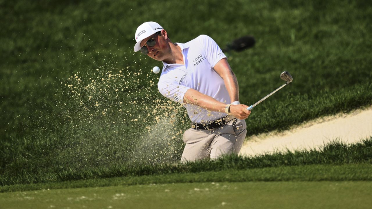 Ben Griffin plays a shot from a bunker on the 11th hole during the second round of the BMW Championship golf tournament Friday, Aug. 15, 2025, in Owings Mills.