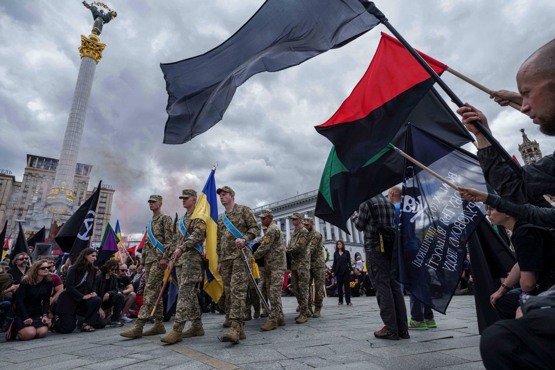 Honor Guards carry the coffin of David Chichkan, a Ukrainian serviceman and artist, during a farewell ceremony at Independence square in Kyiv, Ukraine, on Monday.