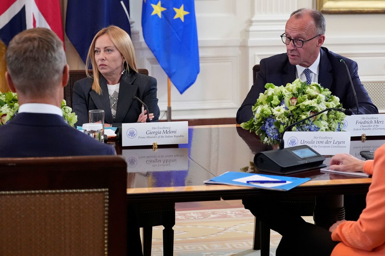 Italy's Prime Minister Giorgia Meloni, left, and Germany's Chancellor Friedrich Merz participate in a meeting with President Donald Trump and Ukrainian President Volodymyr Zelensky.