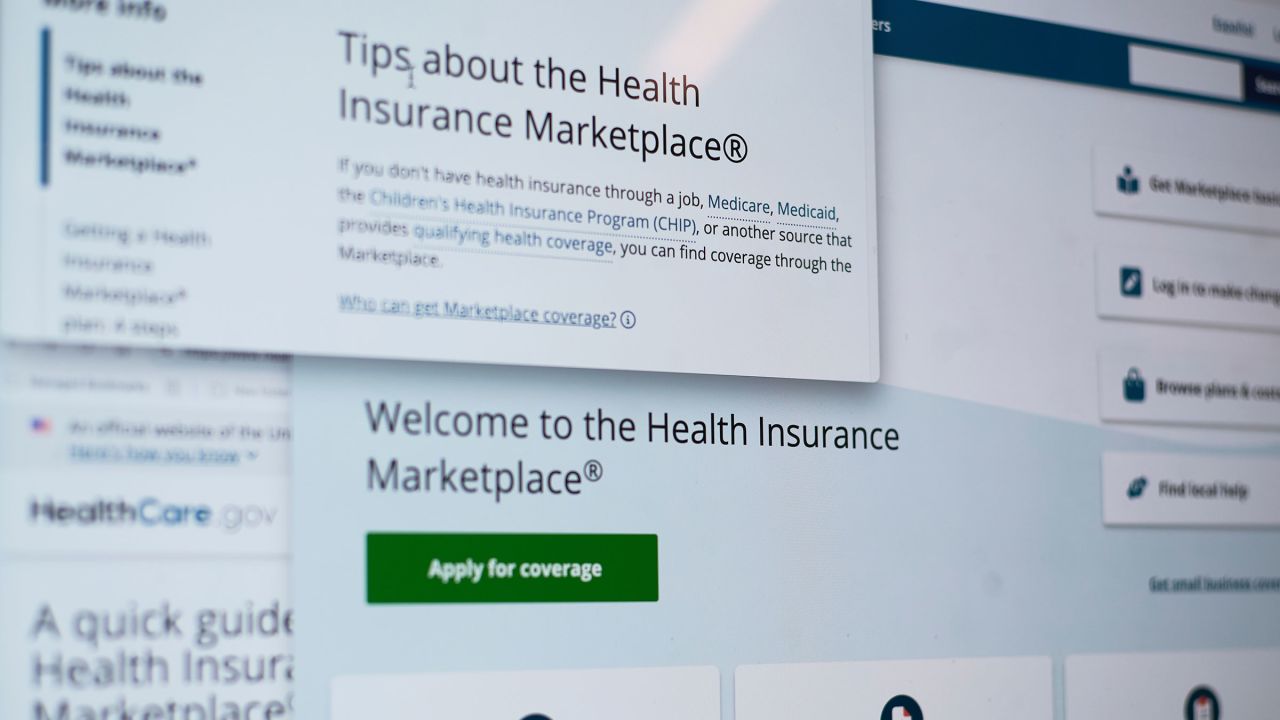 Pages from the Affordable Care Act health insurance website are seen on a computer screen in New York on Tuesday.