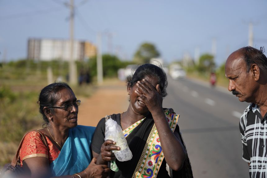 A woman cries as she leaves the site of a mass grave after authorities exhibited unearthed belongings in Chemmani, Sri Lanka, August 5, 2025.