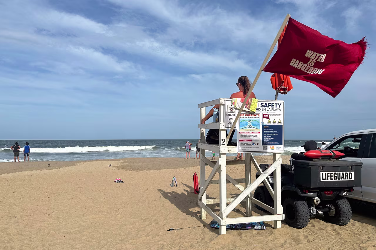 A lifeguard keeps watch along the Atlantic Ocean in Virginia Beach, Virginia. on Wednesday.