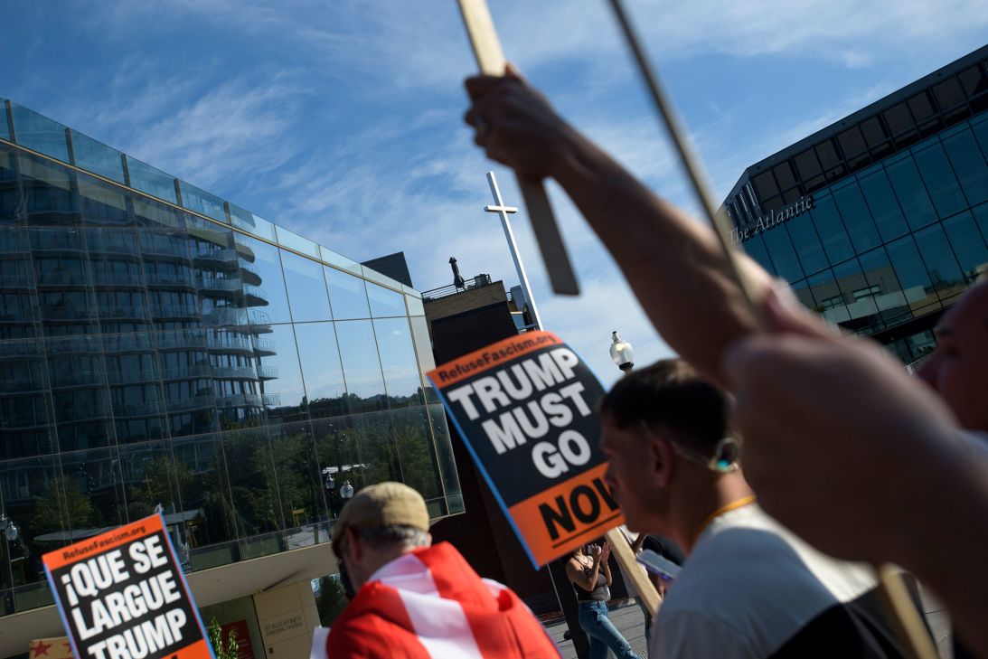 People march in protest of President Donald Trump's use of federal law enforcement and National Guard troops in Washington, DC, on August 23.