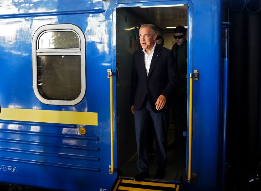 Canadian Prime Minister Mark Carney disembarks a train as he arrives in Kyiv, Ukraine, on August 24.
