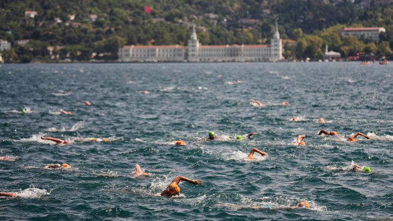 Competitors take part in a 6.5 km swimming race across the Bosphorus Strait, from the Asian side to the European side, in Istanbul, Turkey, Sunday, Aug. 24, 2025. (AP Photo/Khalil Hamra)