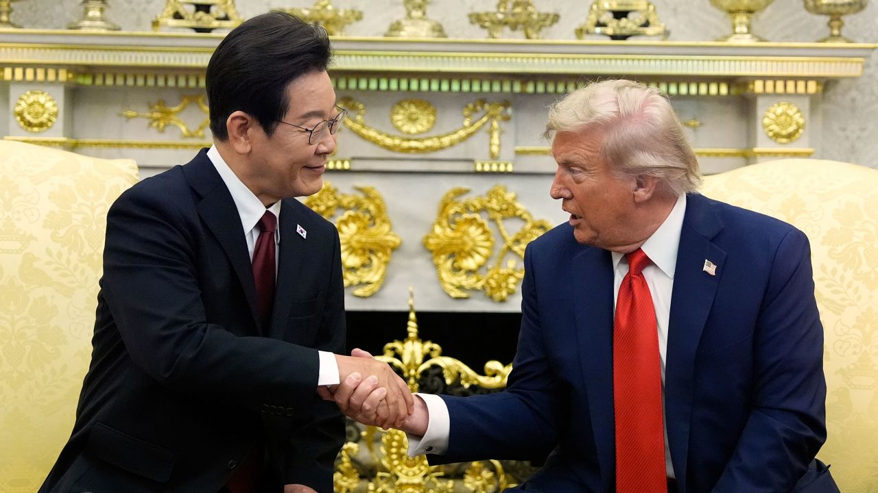 President Donald Trump, right, shakes the hand of South Korean President Lee Jae Myung during a meeting in the Oval Office of the White House, Monday, Aug. 25, 2025, in Washington. (AP Photo/Alex Brandon)