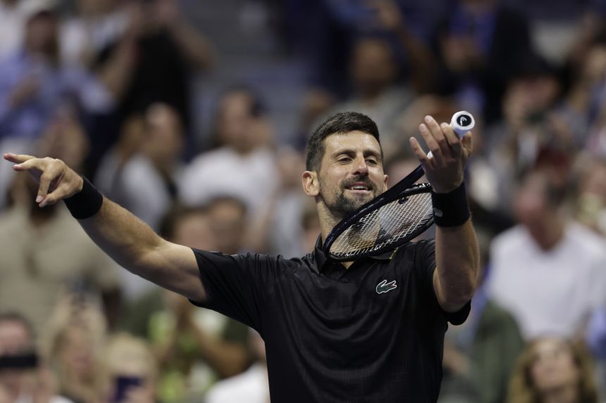 Novak Djokovic celebrates a hard-fought victory over Cameron Norrie.