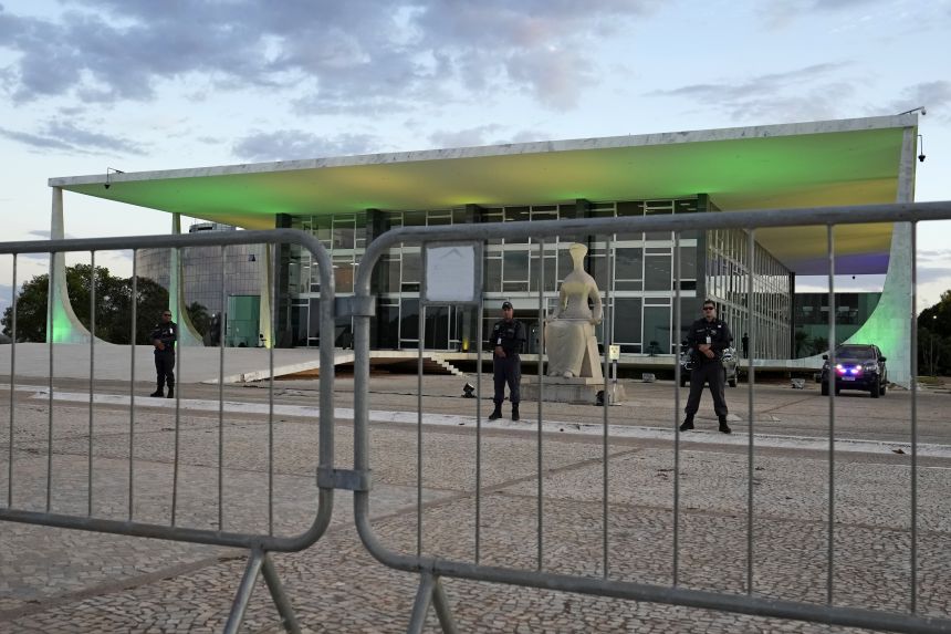 Security guards block off access to the Supreme Court, a day before former President Jair Bolsonaro's trial, in Brasilia, Brazil, on Monday, September 1, 2025.