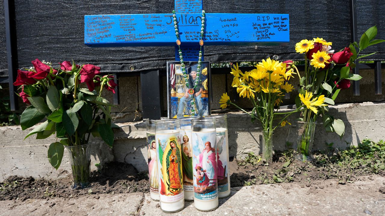 A makeshift memorial for 11-year-old Julian Guzman, who was shot and killed during a doorbell prank, is shown Tuesday, Sept. 2, 2025, in Houston. (AP Photo/David J. Phillip)
