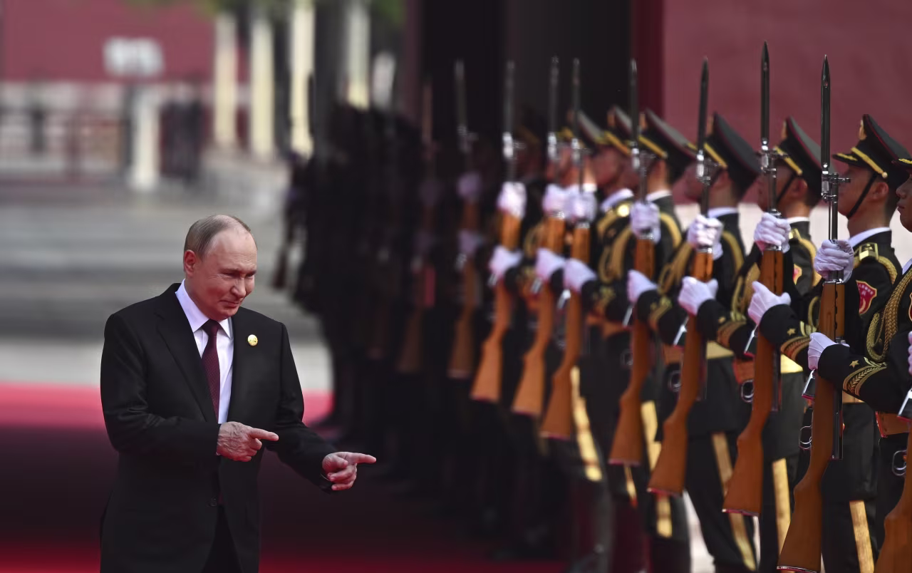 Russian President Vladimir Putin arrives at the parade.