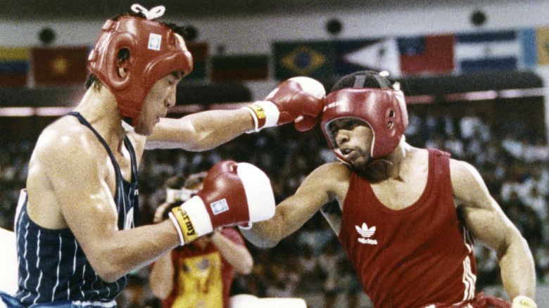 South Korea's Park Si-hun, left, delivers a left jab to Roy Jones Jr. of the United States, during the summer Olympics in Seoul on October 2, 1988.