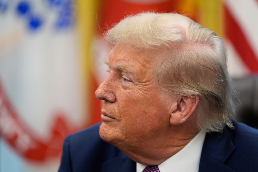 President Donald Trump speaks in the Oval Office of the White House in Washington, DC, on Friday.