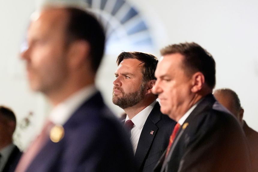 Vice President JD Vance listens as President Donald Trump speaks at a dinner in the Rose Garden of the White House on September 5, 2025.