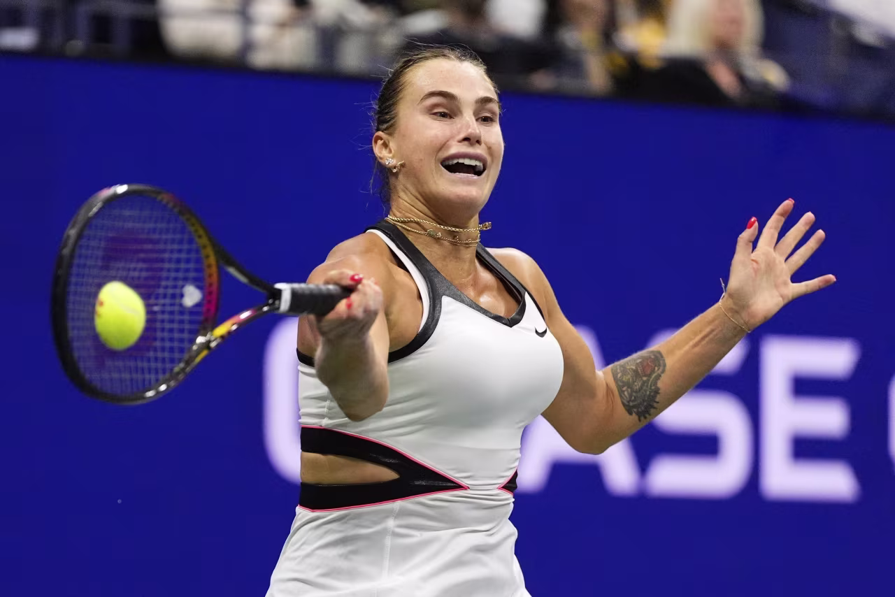Aryna Sabalenka smashes a forehand.