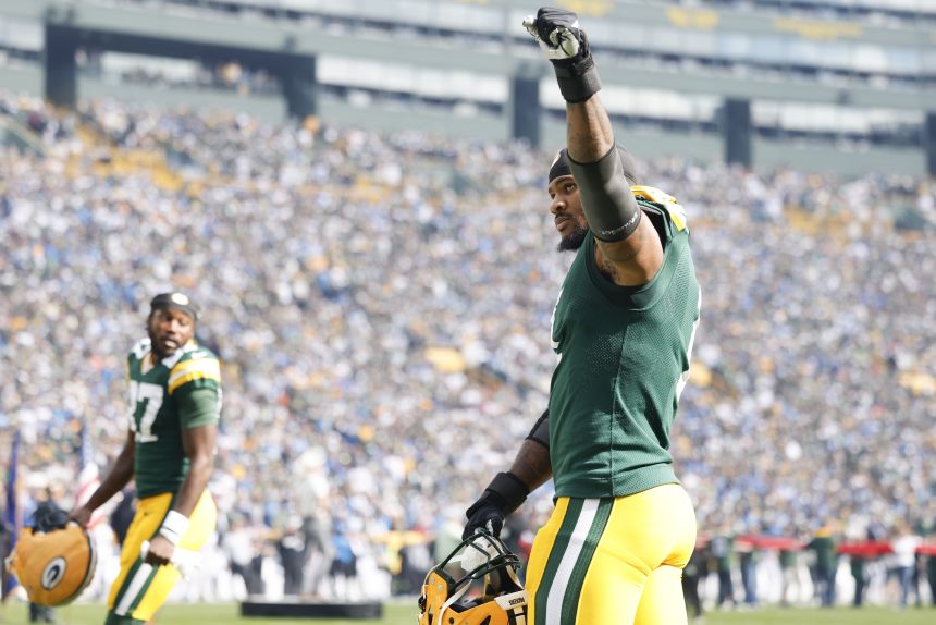 Green Bay Packers defensive end Micah Parsons  on the field before a game against the Detroit Lions.