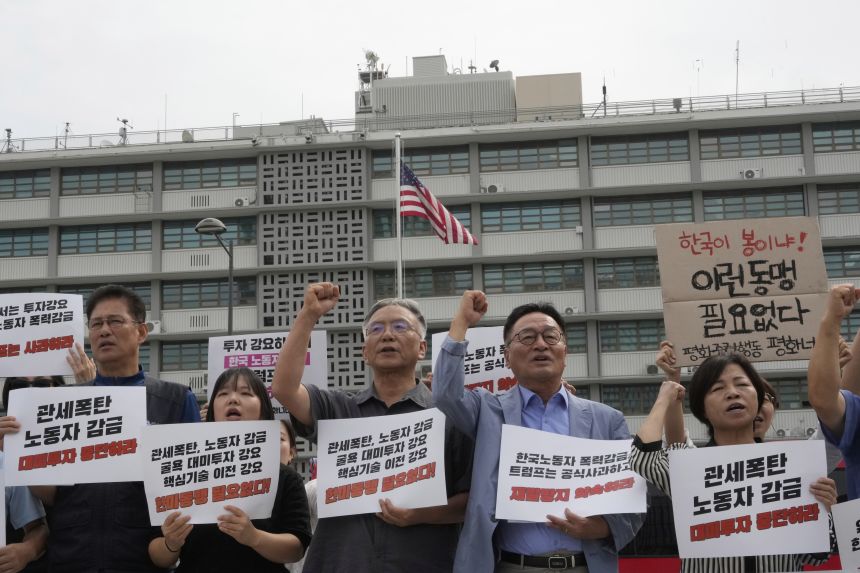 Protesters stage a rally against the detention of South Korean workers during an immigration raid in Georgia, near the US Embassy in Seoul on Tuesday.