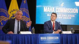 Health and Human Services Secretary Robert F. Kennedy Jr., left, speaks during a Make America Healthy Again Commission meeting at the Department of Health and Human Services headquarters in Washington, DC, on September 9 as Domestic Policy Council Director Vince Haley, right, looks on.