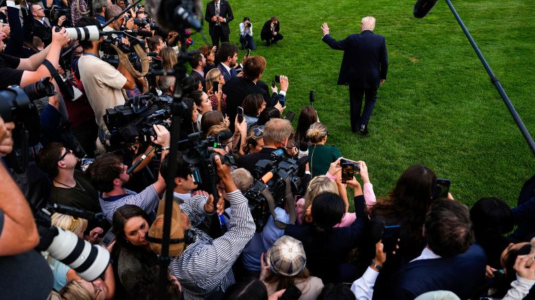 President Donald Trump departs after speaking with reporters on the South Lawn of the White House, on Thursday.