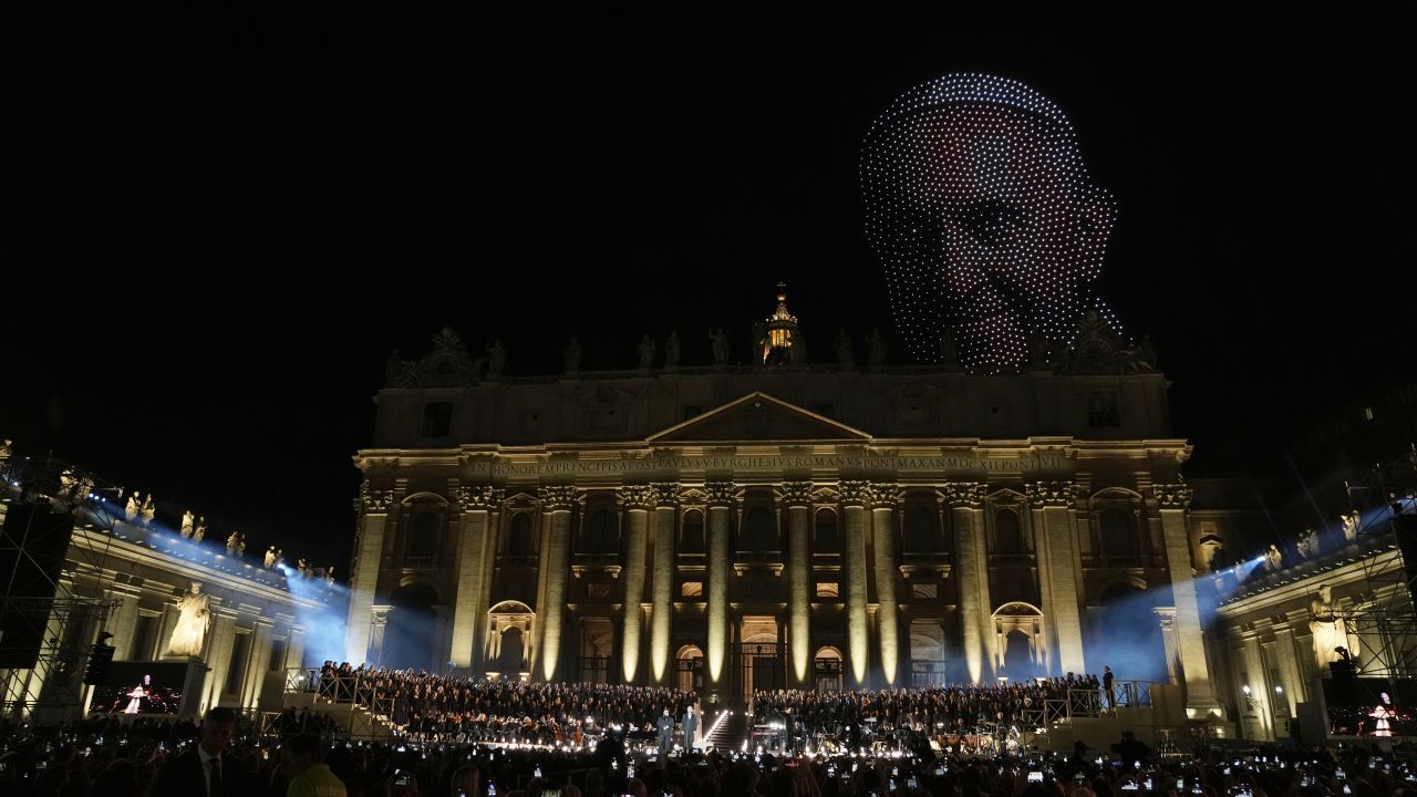 An image of Pope Francis made by drones, hovers over the basilica in St. Peter's Square during a concert marking the conclusion of the World Meeting on Human Fraternity, at the Vatican, on Saturday.