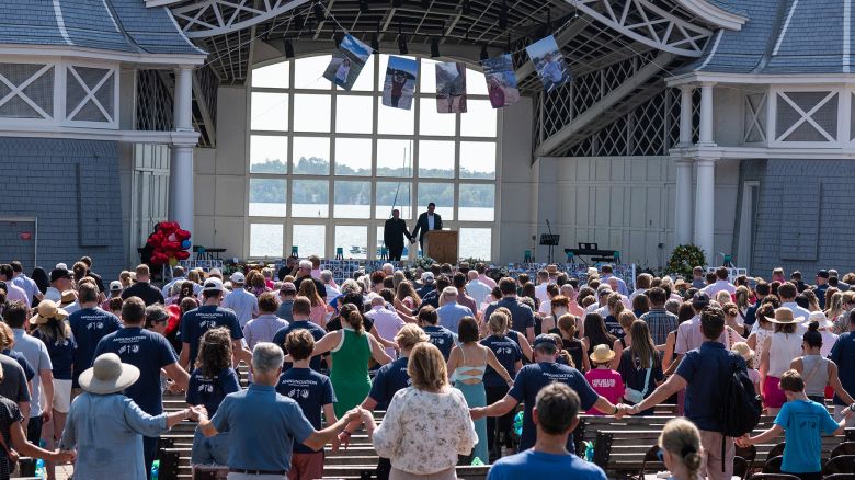 Hundreds gather for a celebration of life for school-shooting victim Harper Moyski at the Lake Harriet Bandshell in Minneapolis on Sunday.