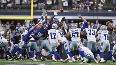 Dallas Cowboys place kicker Brandon Aubrey (17) kicks a game-winning field goal against the New York Giants in overtime of an NFL football game Sunday, Sept. 14, 2025, in Arlington, Texas. (AP Photo/Jerome Miron)