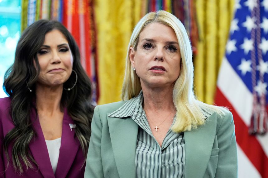 Attorney General Pam Bondi, right, and Homeland Security Secretary Kristi Noem listen as President Donald Trump speaks in the Oval Office on Monday.