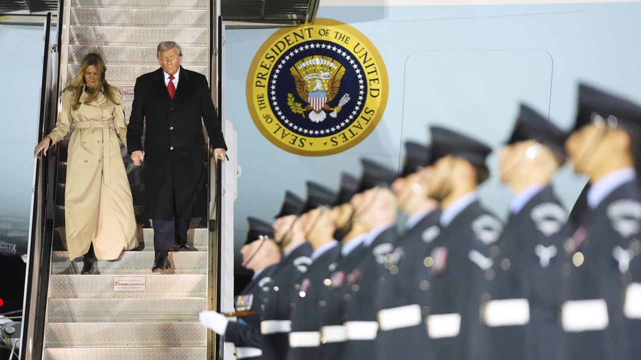 President Donald Trump and first lady Melania Trump exit Air Force One as they arrive at Stansted Airport near London on September 16, 2025.