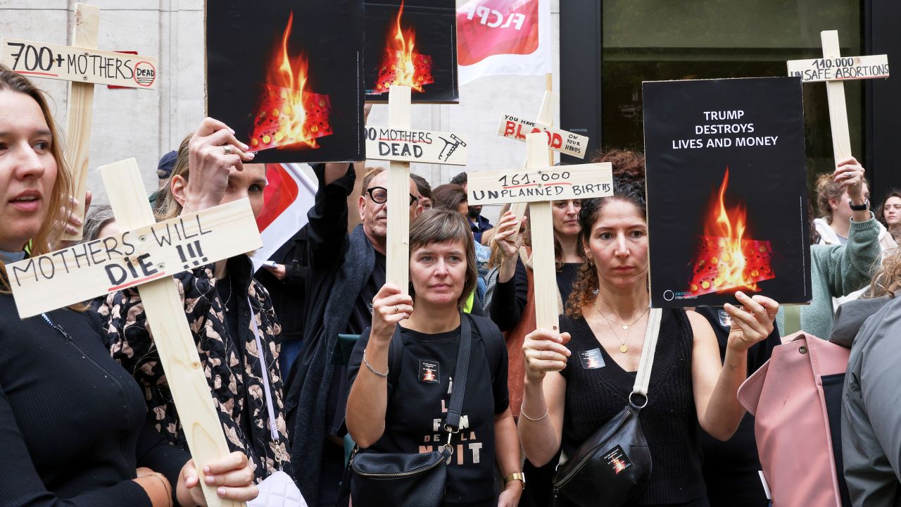 Demonstrators from women's rights organizations gather near the US embassy in Brussels to protest the planned destruction of US-purchased family planning supplies stockpiled in Belgium on September 18.