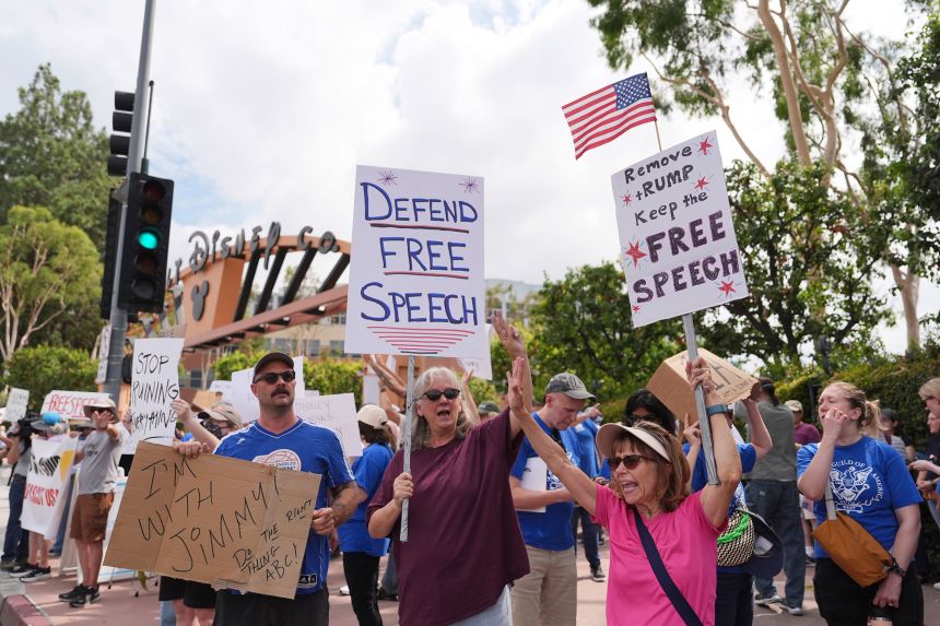 Demonstrators picket in response to the suspension of Jimmy Kimmel's late-night show outside of The Walt Disney Studios Thursday, Sept. 18, 2025, in Burbank, Calif.]